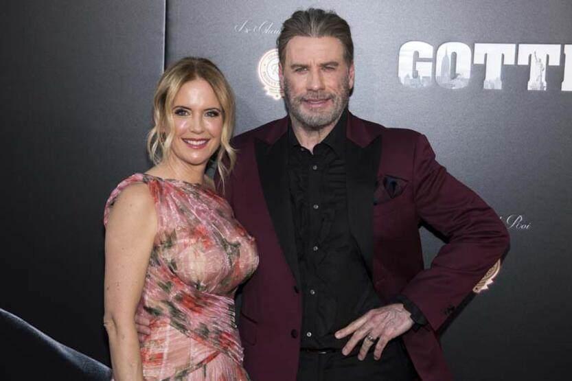 John Travolta ve eşi