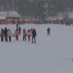 Sarıkamış’ta kar yağışı altında kayak ve snowboard keyfi 