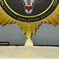 Malatya'da yolcu otobüsünde narkotik araması: 11 kiloyu aşkın zehir yakalandı