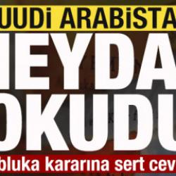 ABD ve İran bayrakları, altın ve petrol varilleriyle temsil edilen küresel piyasa grafiği.