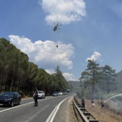 Marmaris'te ormanlık ve ekili tarım arazisinde yangın 