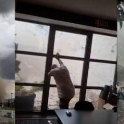 Fransa'yı hortum vurdu! Babanın cam kapıyı tuttuğu anlar viral oldu