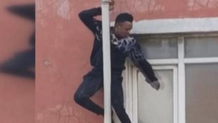 Sultangazi'de yangından kurtulmak için borulara tutunan adamın düştüğü anlar kamerada