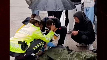 İ&ccedil;işleri Bakanı &Ccedil;ift&ccedil;i, kazada yaralanan gence şemsiye tutan trafik polisini tebrik etti