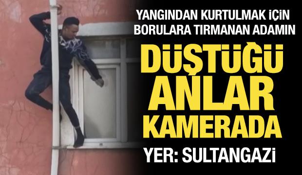 Sultangazi'de yangından kurtulmak için borulara tutunan adamın düştüğü anlar kamerada