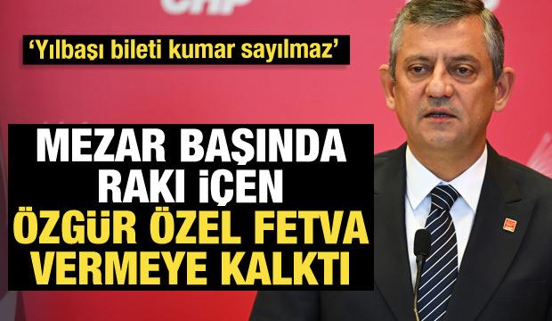 Mezar başında rakı i&ccedil;en &Ouml;zg&uuml;r &Ouml;zel fetva vermeye kalktı: Yılbaşı bileti kumar sayılmaz