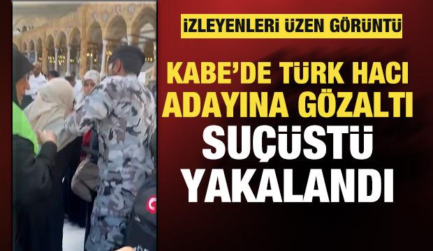 Kabe'nin &ouml;rt&uuml;s&uuml;n&uuml; makasla kesmeye &ccedil;alışan T&uuml;rk hacı g&ouml;zaltına alındı!