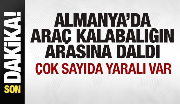 Almanya'da araç kalabalığın arasına daldı