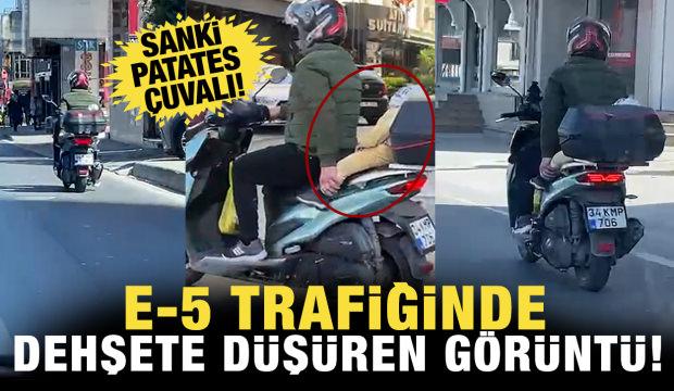 E-5&rsquo;te skandal g&ouml;r&uuml;nt&uuml;: Bebeği motosiklete lastikle bağlayıp trafiğe &ccedil;ıktı