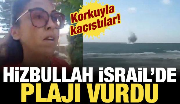Hizbullah'ın attığı roketlerin denize düşmesi plajdaki İsraillilerde korkuya neden oldu