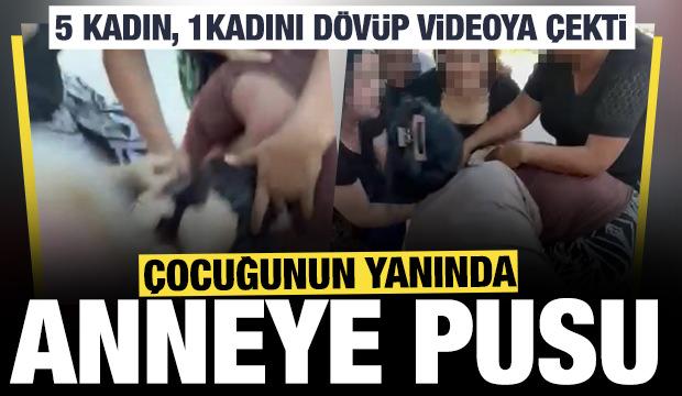 &Ccedil;ocuğunun g&ouml;z&uuml; &ouml;n&uuml;nde dehşet: 5 kadın, 1 anneyi d&ouml;v&uuml;p videoya &ccedil;ekti