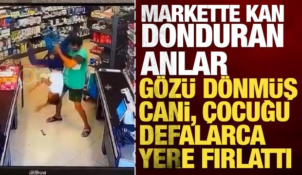Markette kan donduran anlar: G&ouml;z&uuml; d&ouml;nm&uuml;ş cani &ccedil;ocuğu defalarca yere fırlattı