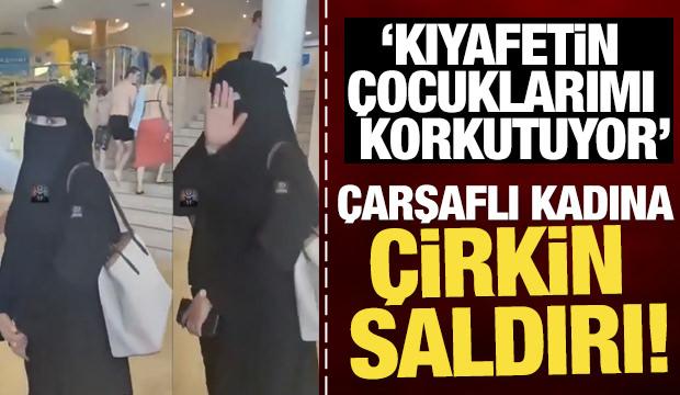 Çarşaflı kadına çirkin saldırı! 'Kıyafetin çocuklarımı korkutuyor'