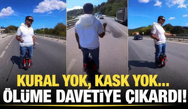 Trafikte akılalmaz anlar: Tek tekerlekli scooter ile tırların sağından geçti