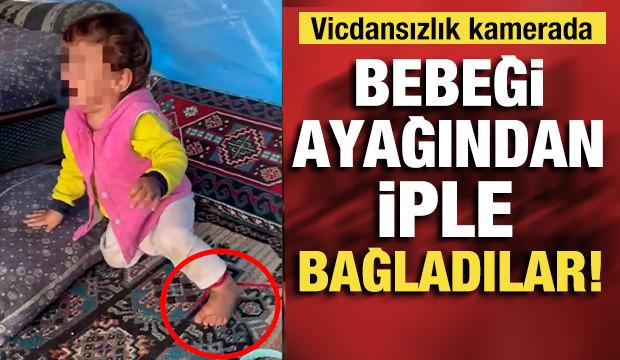 Adana'da y&uuml;rek sızlatan g&ouml;r&uuml;nt&uuml;: "Durmuyor" bahanesiyle ayağından iple bağladılar