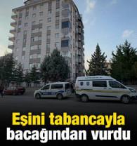 Eşini tabancayla bacağından vurdu