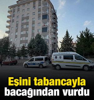 Eşini tabancayla bacağından vurdu