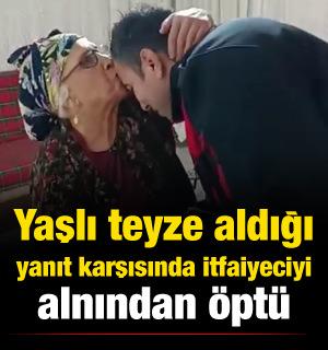 Hatay'da yaşlı kadın aldığı yanıt karşısında itfaiyeciyi alnından &ouml;pt&uuml;