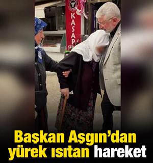 Başkan Aşgın'dan y&uuml;rek ısıtan hareket: Yaşlı kadını makam aracıyla k&ouml;y&uuml;ne bıraktı
