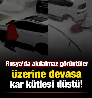 Rusya'da bir kadının &uuml;zerine dev kar k&uuml;tlesi d&uuml;şt&uuml;