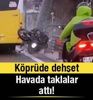 K&ouml;pr&uuml;de otob&uuml;s ve bariyer arasına giren motosikletli havada taklalar attı!