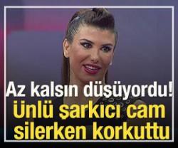 &Uuml;nl&uuml; şarkıcı cam silerken korkuttu