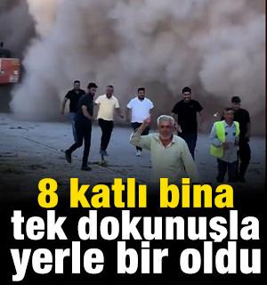 8 katlı bina iş makinesinin tek dokunuşuyla yerle bir oldu