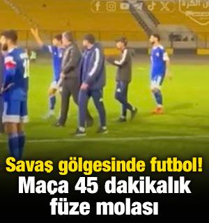 Savaş g&ouml;lgesinde futbol! Ma&ccedil;a 45 dakikalık f&uuml;ze molası