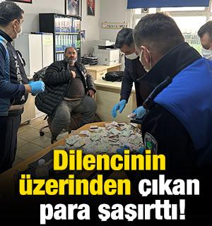 Dilencinin &uuml;zerinden &ccedil;ıkan para şaşırttı!