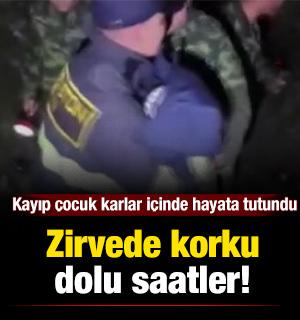 Zirvede korku dolu saatler: Kayıp &ccedil;ocuk karlar i&ccedil;inde hayata tutundu