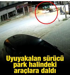 Uyuyakalan s&uuml;r&uuml;c&uuml; park halindeki ara&ccedil;lara daldı