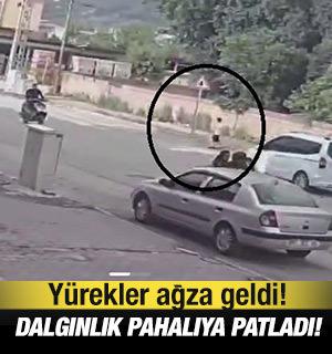 Y&uuml;reklerin ağza geldiği an! Dalgın &ccedil;ocuk az kalsın arabanın altında kalıyordu