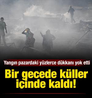 Bir gecede k&uuml;ller i&ccedil;inde kaldı: Yangın pazardaki y&uuml;zlerce d&uuml;kkanı yok etti