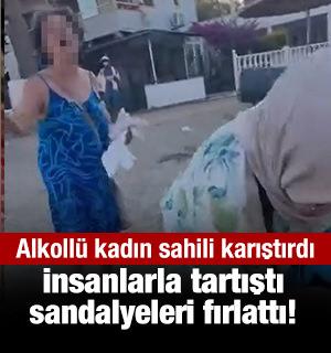 İzmir'de plajda  alkoll&uuml; kadın anne ve kızına s&ouml;zl&uuml; saldırıda bulundu rahatsızlık verdi