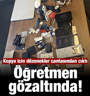 Kopya i&ccedil;in d&uuml;zenekler &ccedil;antasından &ccedil;ıktı: &Ouml;ğretmen g&ouml;zaltında!