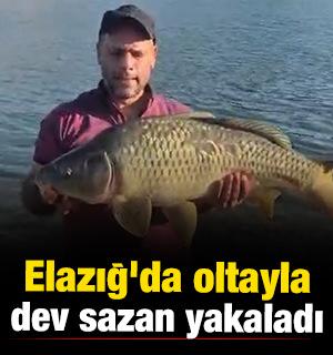 Elazığ'da oltayla dev sazan yakaladı