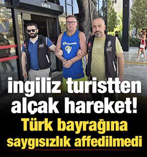 T&uuml;rk bayrağına t&uuml;k&uuml;ren İngiliz turist tutuklandı!