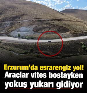 Erzurum'da esrarengiz yol! S&uuml;r&uuml;c&uuml;ler şokta... Ara&ccedil;lar vites boştayken yokuş yukarı gidiyor