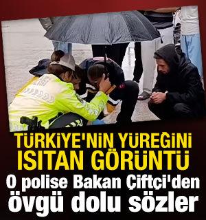 İ&ccedil;işleri Bakanı &Ccedil;ift&ccedil;i, kazada yaralanan gence şemsiye tutan trafik polisini tebrik etti
