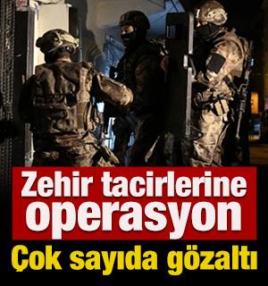İzmir'de zehir tacirlerine operasyon: &Ccedil;ok sayıda g&ouml;zaltı